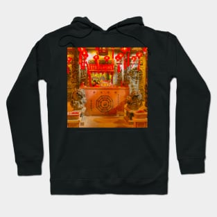 Hotel reception styled like ancient Chinese temple altar. SQe Hoodie